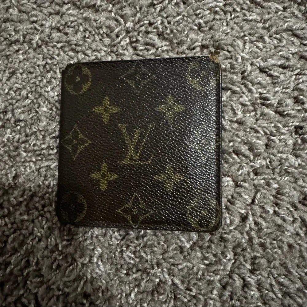 Louis Vuitton Bi fold Brown Wallet